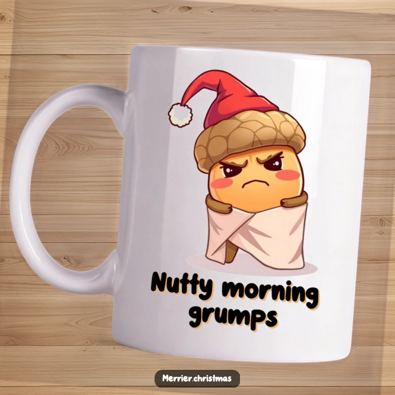 Funny mug featuring a grumpy, oversized acorn wearing a tiny Santa hat, struggling to wrap itself alone in shiny holiday paper.