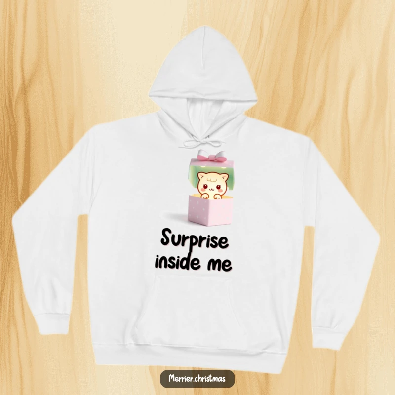 Funny hoodie with a kawaii gift box character opening to reveal a magical, twinkling light, perfect for cozy, surprising moments.