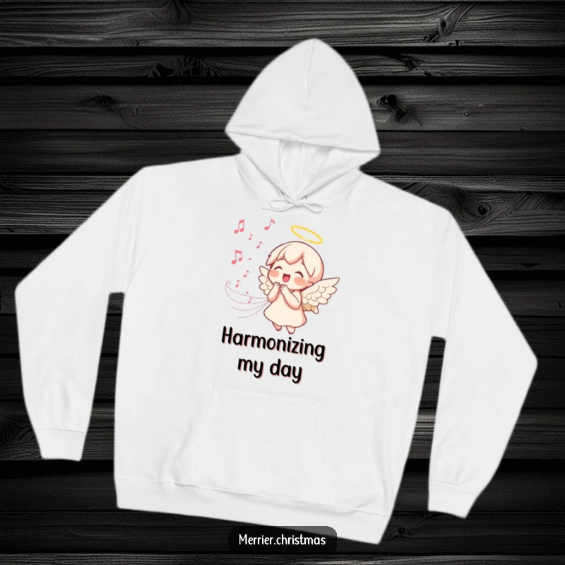 Funny kawaii angel hoodie featuring a singing angel with a joyful expression and flowing music notes, perfect for cozy, peaceful wear.